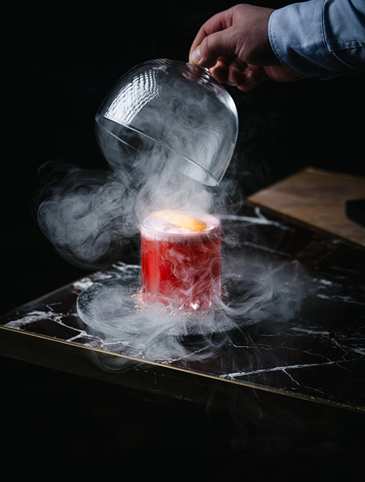 A smoky pink cocktail, served at Dans le Noir ?