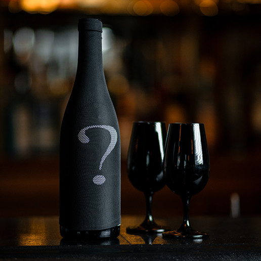 Bouteille de vin mystérieuse pour un blind date à Dans le Noir ?